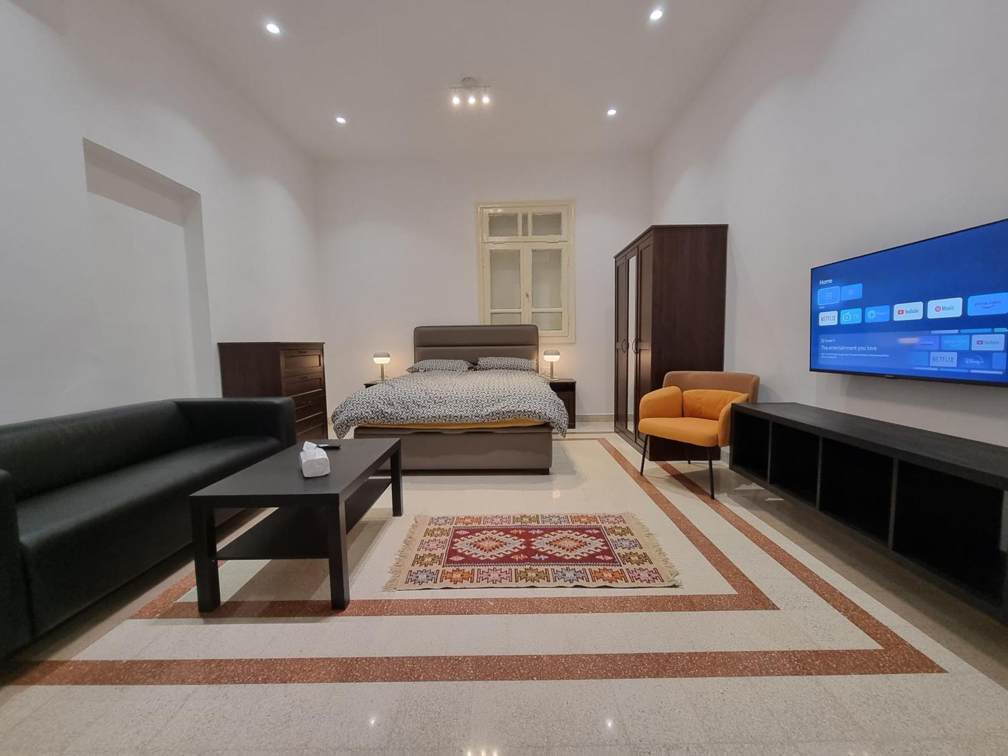 Downtown Living Boutique Apartments Амман Номер фото